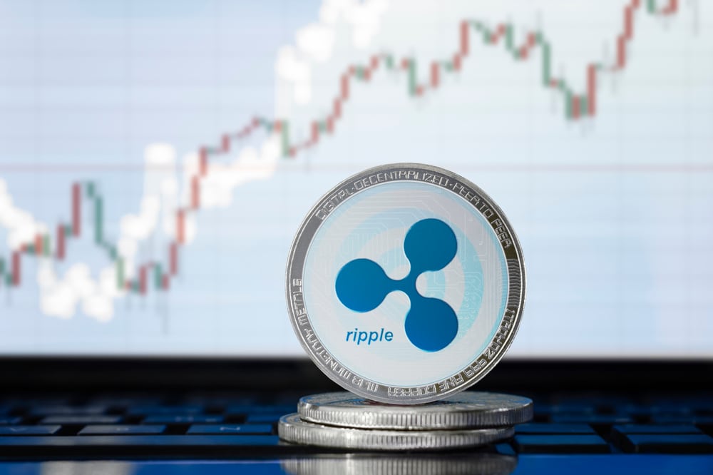 Ripple,(xrp),Cryptocurrency;,Physical,Concept,Ripple,Coin,On,The,Background - Tokenhell