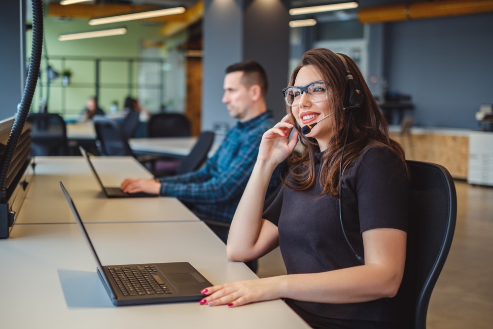 Beautiful,Female,Operator,Talking,On,The,Headset,With,Client,And - Tokenhell Welzone Customer Support Program