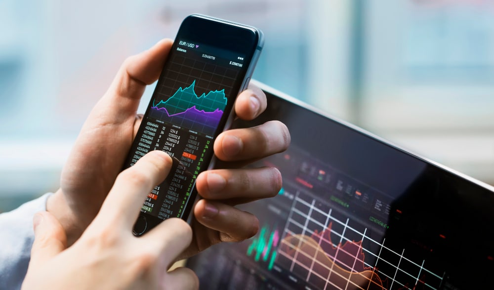 Business,Man,Holding,Phone - Tokenhell