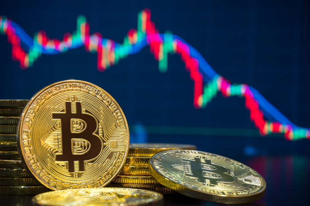 BitcoinAndCryptocurrencyTradingSystemConcept-ImageOfPhysical - Tokenhell Bitcoin Crosses Above $67k as Traders Navigate "Liquidity Hunt" Post-Rally