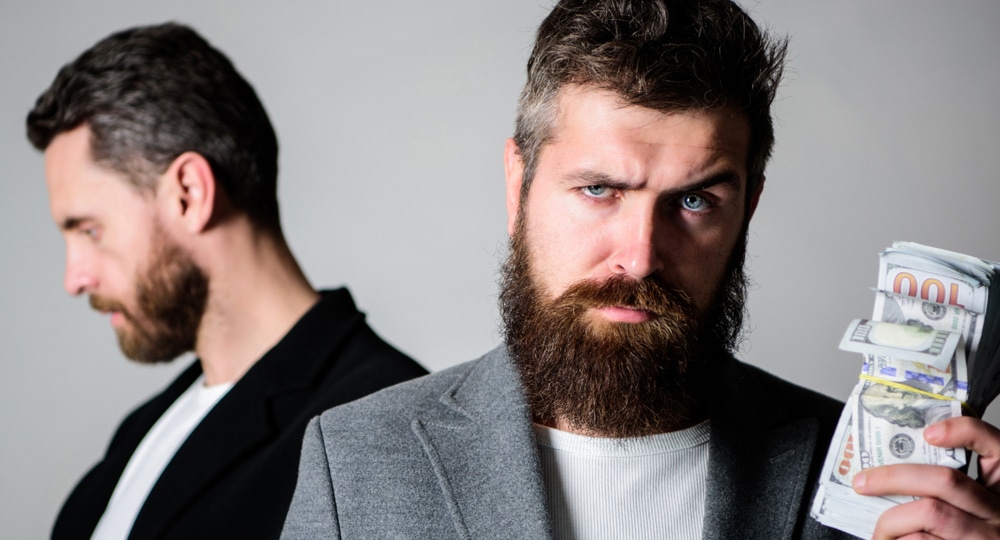 Scam,And,Deception.,Man,Bearded,Fraudster,Hold,Cash,Money,While - Tokenhell