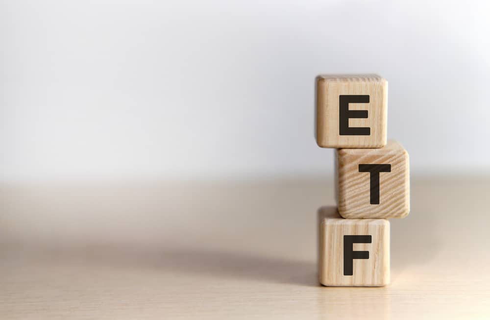 Etf-ExchangeTradedFundTextOnWoodenCubesOn - Tokenhell SEC Charges VanEck Over ETF Marketing Violation