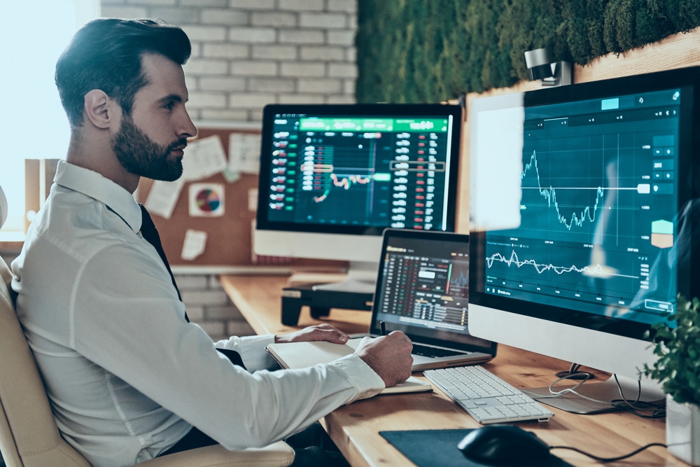 Concentrated,Young,Modern,Man,In,Formalwear,Working,Using,Computers,While - Tokenhell