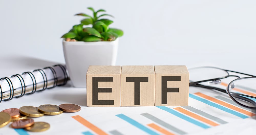 EtfWordOnWoodBlocksConceptWithChartCoinsNotebook - Tokenhell Millennium Management Holds Nearly $2 Billion in Bitcoin ETF Products