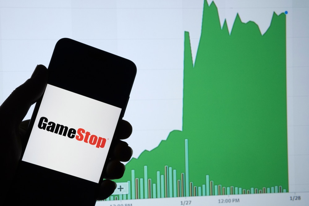 GamestopRetailCompanyLogoOnTheSmartphoneAndItsAuthentic - Tokenhell SEC Chair's Evasive Remarks on Roaring Kitty Prompt GameStop Stock Surge