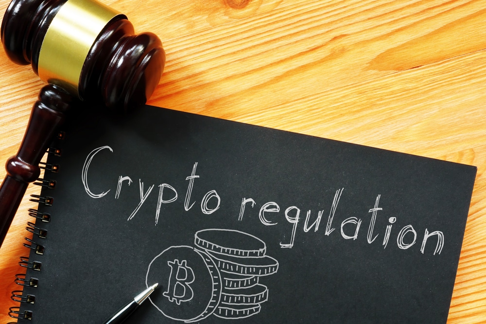 CryptoRegulationIsShownOnTheBusinessPhotoUsingThe - Tokenhell