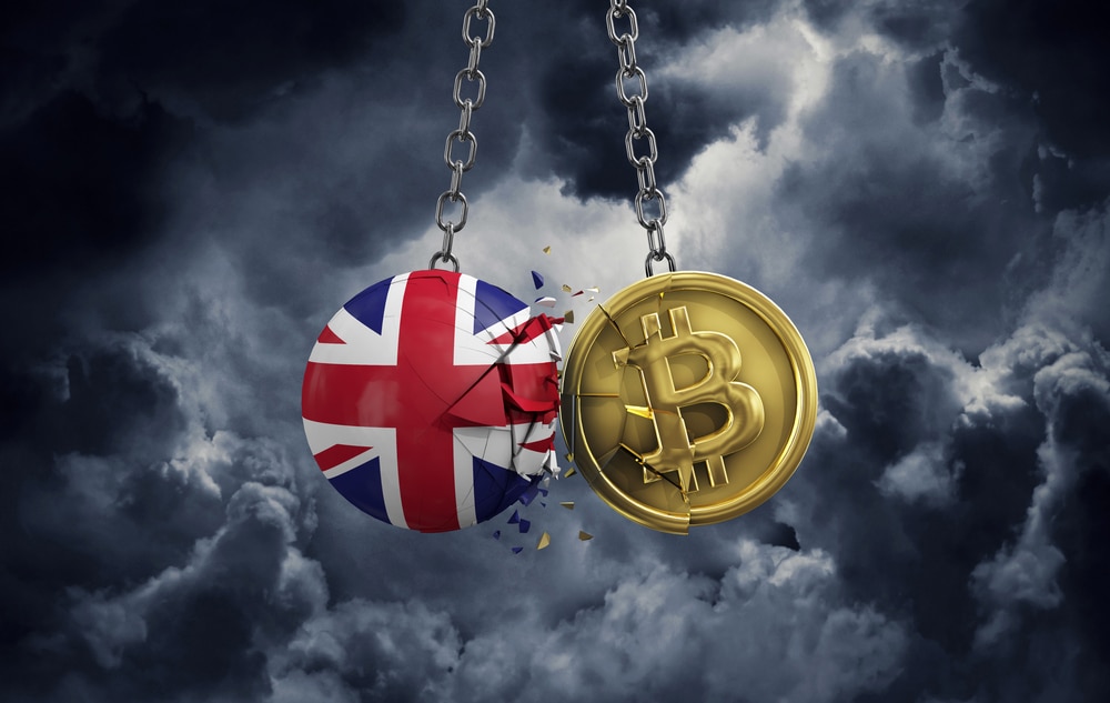UkFlagSmashingIntoAGoldBitcoinCryptoCoin3d - Tokenhell UK Grants Crime Agency and Police Powers to Seize and Freeze Crypto