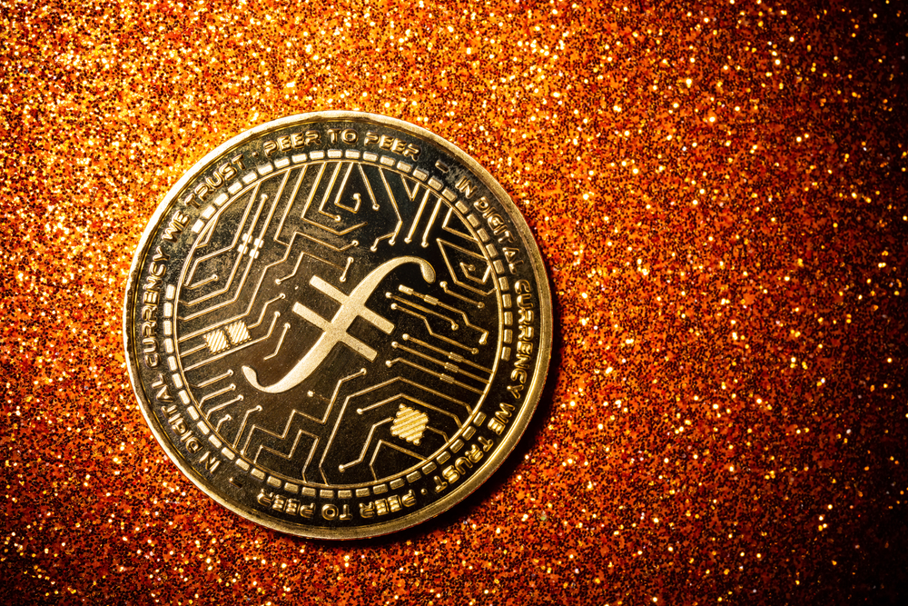 Filecoin,On,A,Dark,Background,Close,Up - Tokenhell