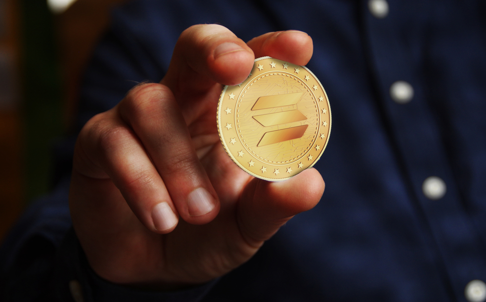 Solana,Altcoin,Cryptocurrency,Symbol,Golden,Coin,In,Hand,Abstract,Concept. - Tokenhell