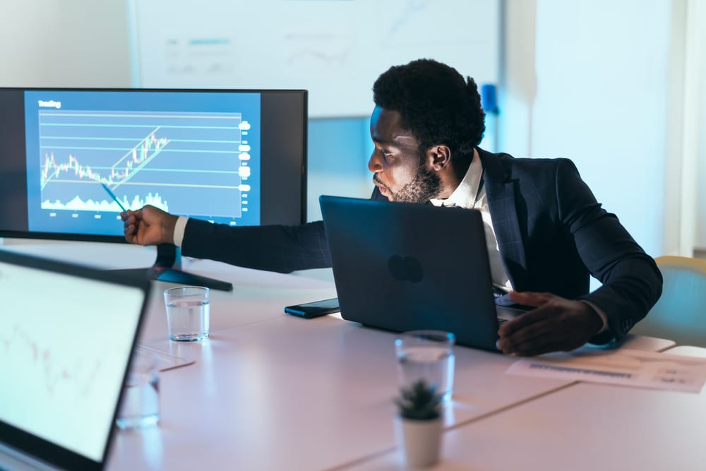 Business,Stock,Trader,Man,Working,On,Crypto,Currency,Markets,With - Tokenhell