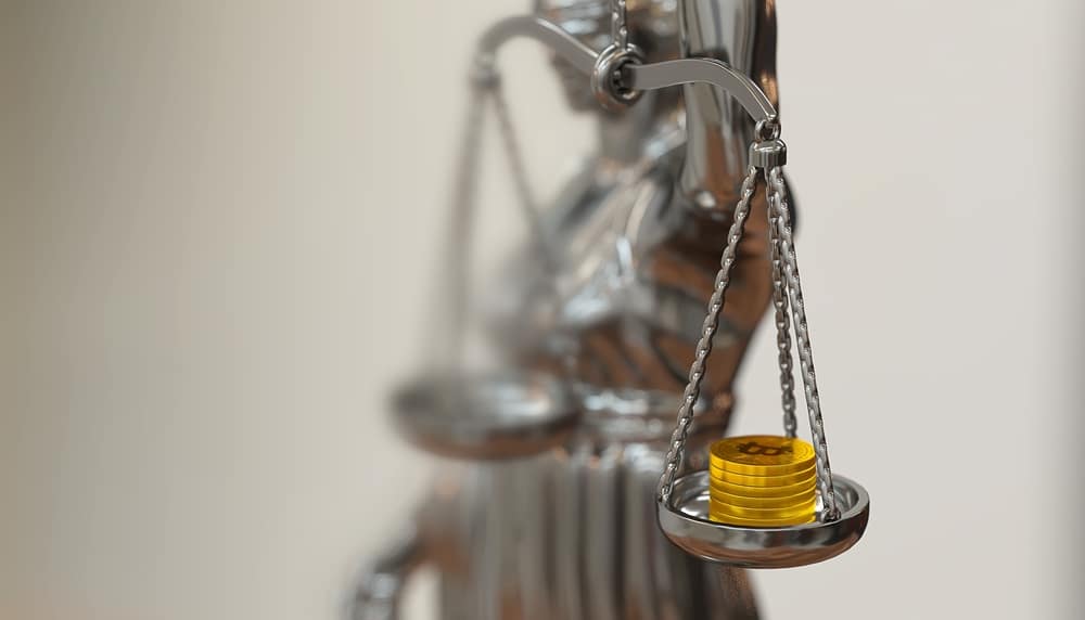 CloseUpOfSilverStatueOfJusticeSymbolLadyHolding - Tokenhell Crypto.com Gets VASP License from Ireland’s Central Bank