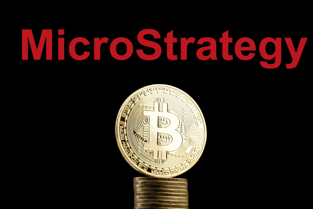 Bitcoin,Btc,Representation,Coin,With,Microstrategy,Text,In,Background. - Tokenhell