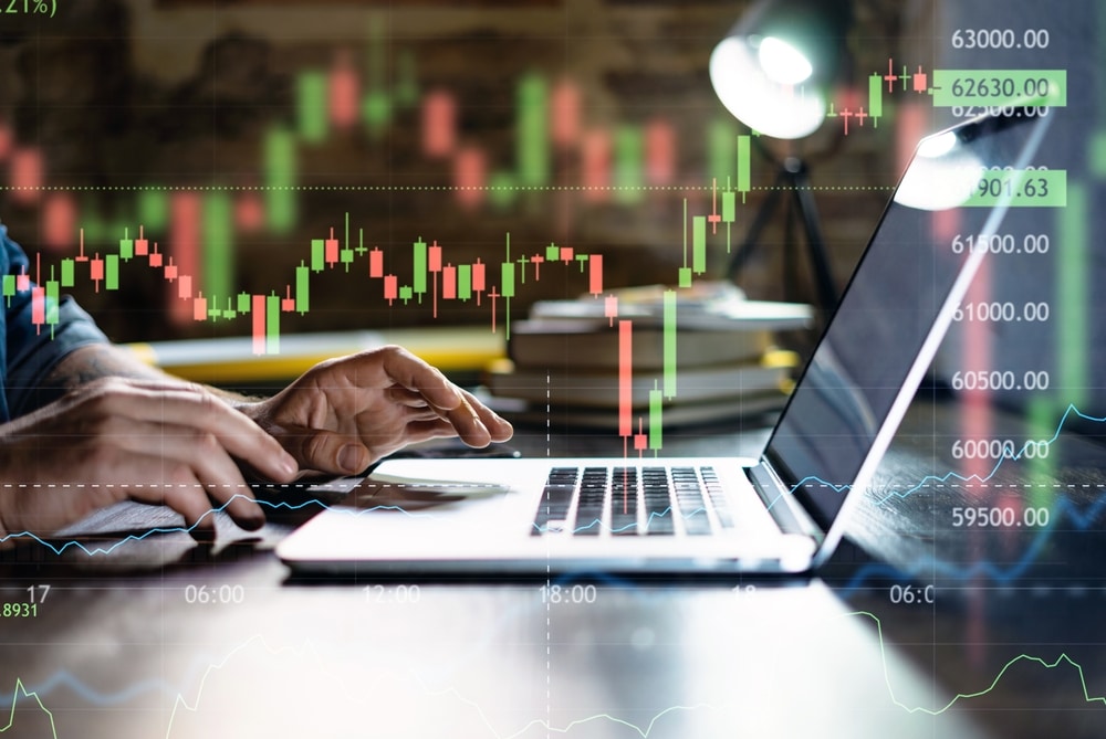 Trader,At,Home,,Working,On,Laptop,With,Graphs,And,Diagrams. - Tokenhell