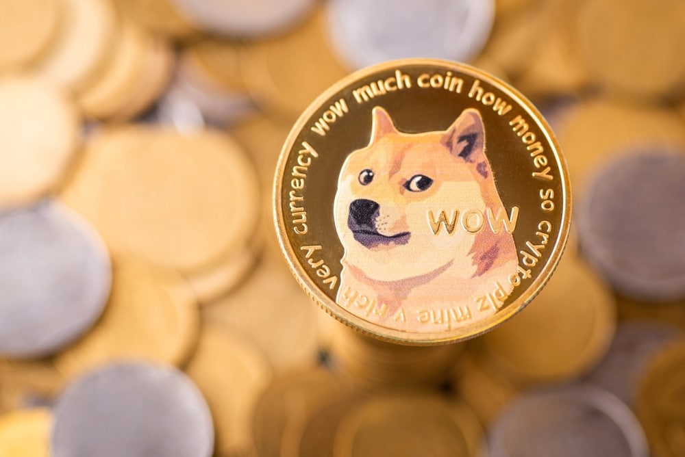 TheGoldenDogecoinWithBackgroundOfRegularCoinsDogecoinCryptocurrency - Tokenhell Whale Activity Spurs Dogecoin's 10% Price Rally with 600 Million DOGE Transferred