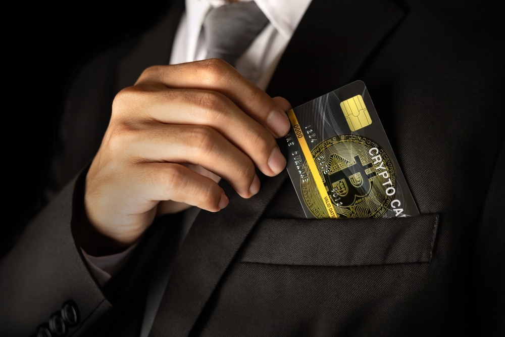 Man,Take,Out,The,Crypto,Card,From,The,Suit,Pocket. - Tokenhell