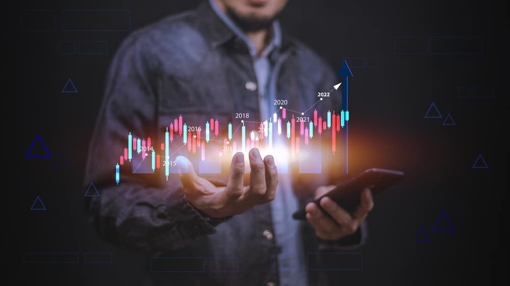 Businessman,Using,Smartphone,Or,Tablet,Trading,Online,In,Bitcoin,Forex - Tokenhell