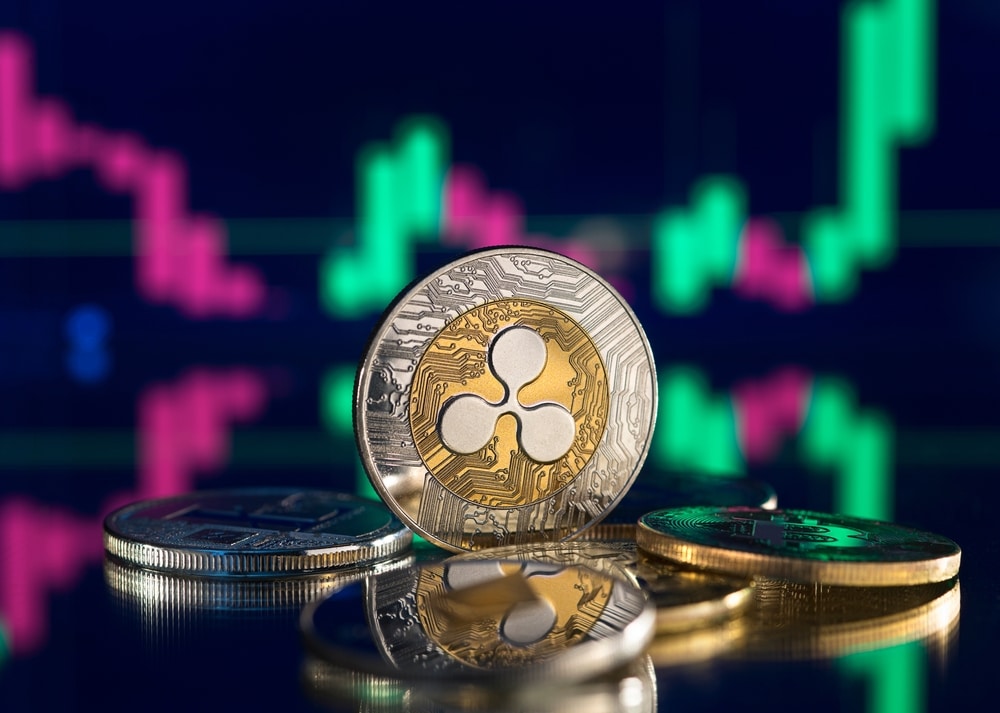 BitcoinAndCryptocurrencyInvestingConceptCryptocurrencyGoldenCoinWithGold - Tokenhell The Year in XRP: ETF Hopes Grow as Regulatory Battle Between Ripple and SEC Continues