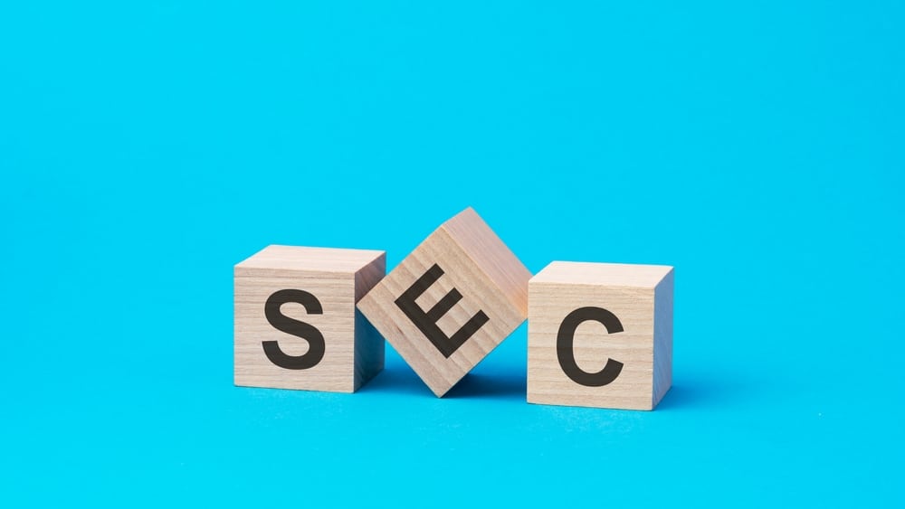 Sec,Text,On,Wooden,Blocks,,Financial,Business,Concept,,Blue,Background. - Tokenhell
