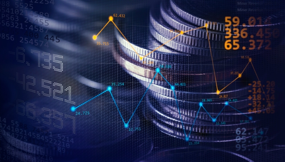 DoubleExposureImageOfCoinStacksOnTechnologyFinancialGraph - Tokenhell