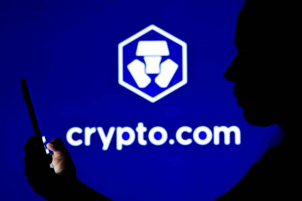 August262022BrazilInThisPhotoIllustrationAWomans - Tokenhell Crypto.com to Delist USDT and 9 Other Cryptocurrencies in Europe on January 31
