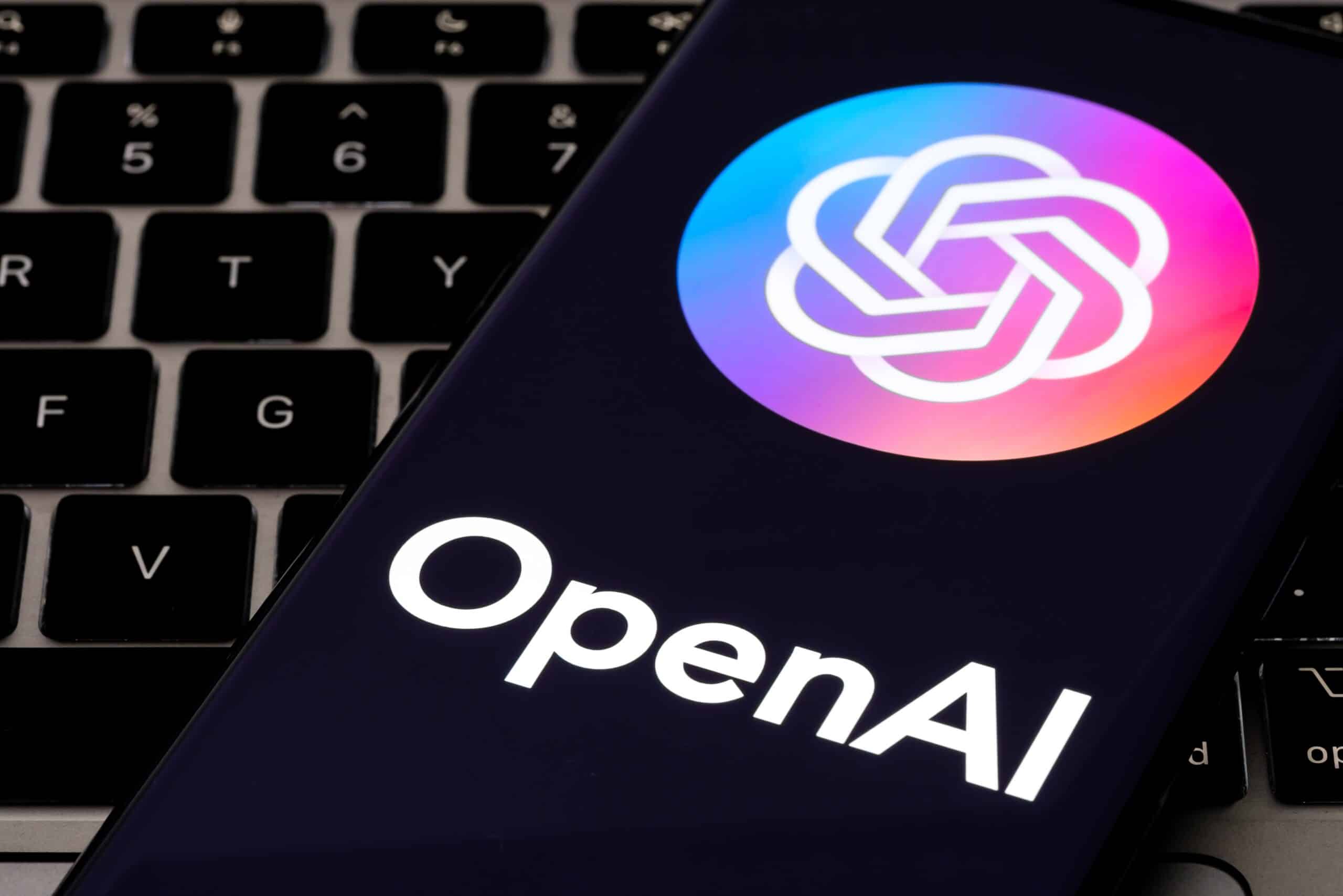 OpenaiLogoSeenOnTheScreenOfSmartphoneAiSoftware - Tokenhell OpenAI Faces Scrutiny Under Italian Data Protection Laws