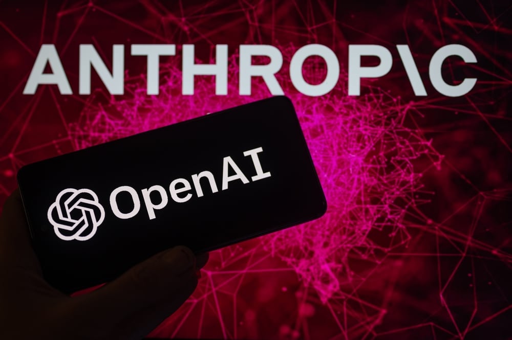 OpenaiDisplayedOnASmartphoneWithAnthropicSeenInThe - Tokenhell John Schulman Leaves OpenAI for Rival Anthropic to Focus on AI Alignment
