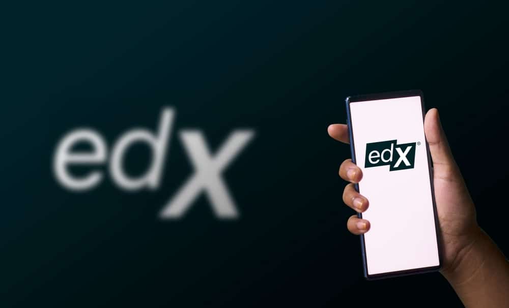 DhakaBangladesh-21December2023EdxLogoOnSmartphone - Tokenhell EDX Markets CEO Hails Larger Opportunities Outside US Following Crypto Exchange Expansion to Singapore