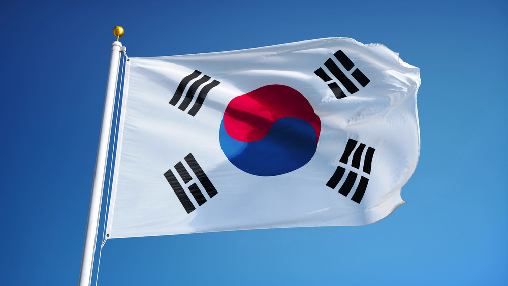 SouthKoreaFlagWavingAgainstCleanBlueSkyCloseUp - Tokenhell South Koreans Elect Pro-Crypto Candidate Lee Jae-Myung as President
