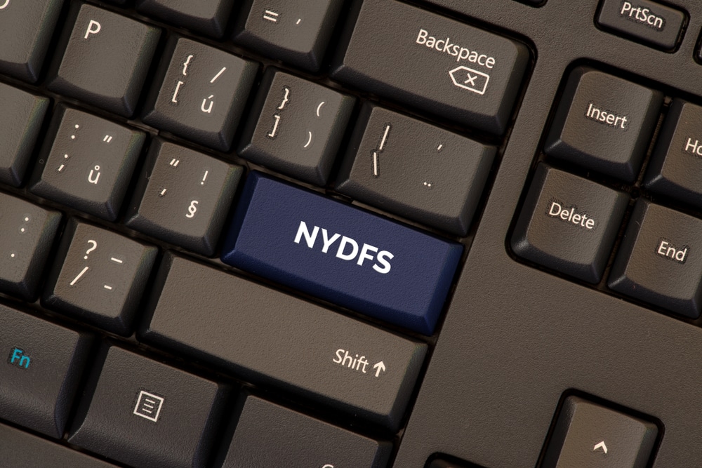 Nydfs,Cybersecurity,Regulations,Blue,Button,In,Black,Keyboard - Tokenhell