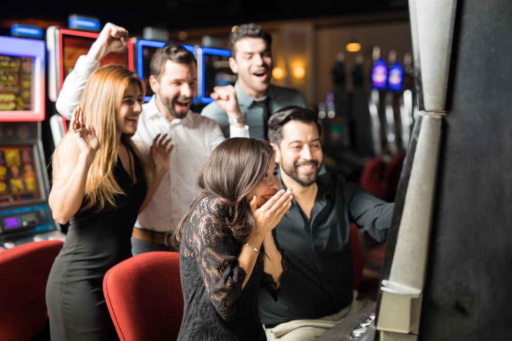 Beautiful,Hispanic,Woman,Looking,Excited,About,Hitting,The,Jackpot,In - Tokenhell